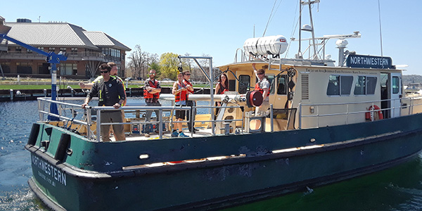 NMC Marine Tech students conduct multibeam sonar operations aboard the research vessel Northwestern