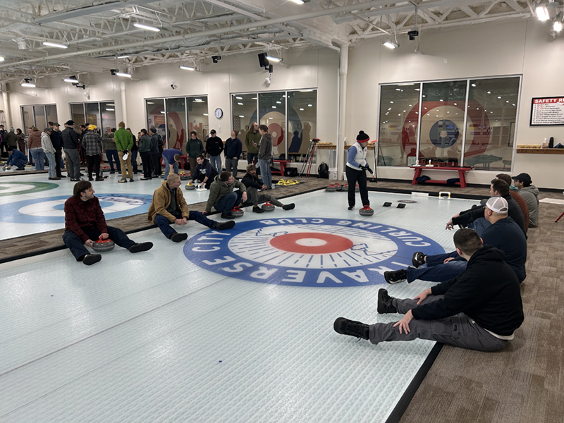 NMC students and employees learning to curl